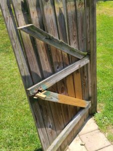 Fence door needs repair
